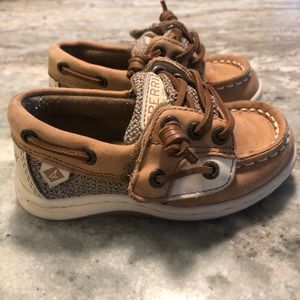Baby Sperry boat shoes with Velcro closure.